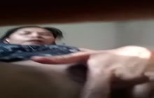 Asian slut rubs pussy on cam
